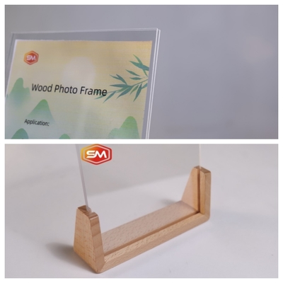 Marco fotográfico acrílico transparente con base de madera